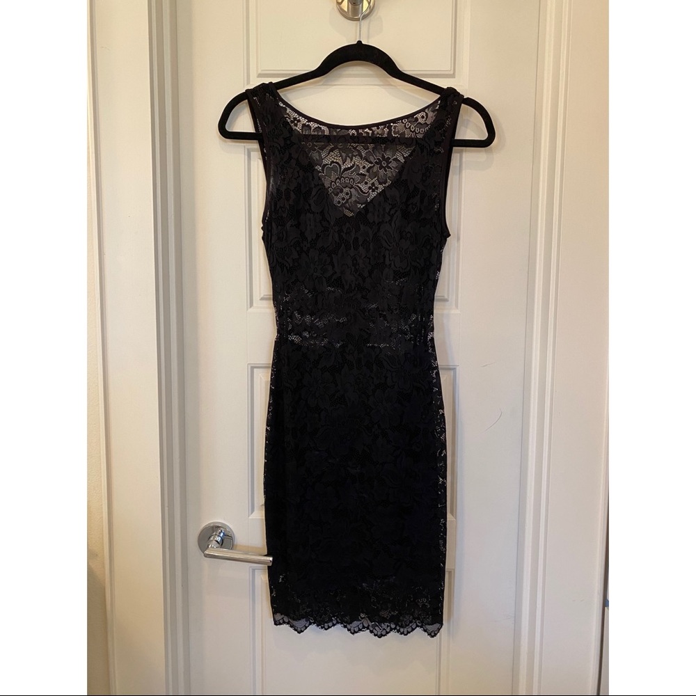 Bebe black bodycon lace dress with cut out